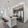 A bright, white open apartment floorplan featuring a kitchen with dark wood cabinetry in an apartment near Keller TX.
