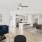 A sleek and luxurious living room that is brightly lit in an apartment in Fort Worth