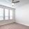 View of a spacious bedroom in a pet friendly apartment in Fort Worth.