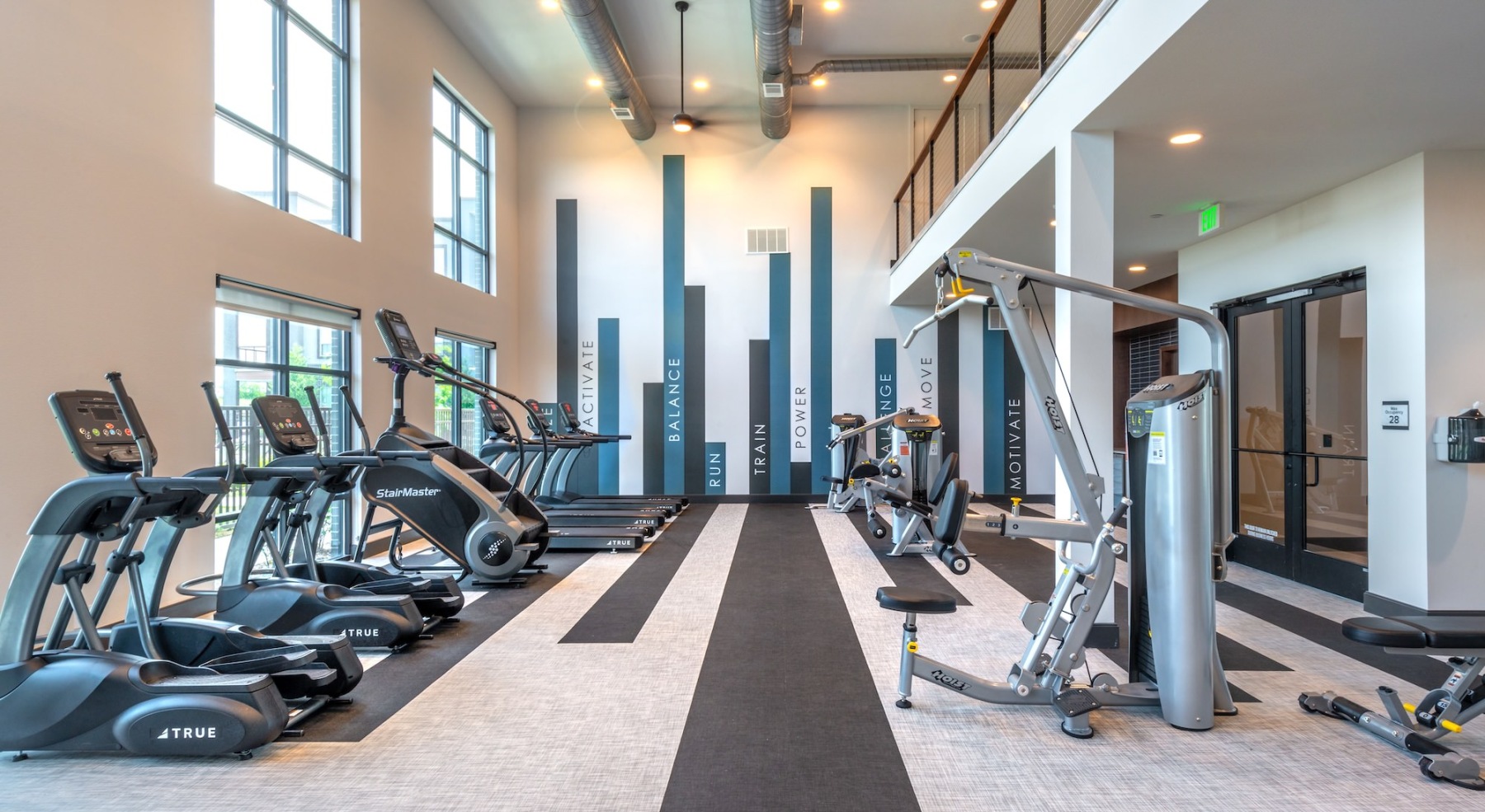 fitness center with exercise equipment